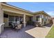 Backyard featuring covered patio with outdoor seating and kitchen area at 4302 E Cynthia St, Gilbert, AZ 85295