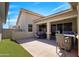 Covered outdoor patio including dining seating and outdoor kitchen area at 4302 E Cynthia St, Gilbert, AZ 85295