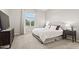 Serene bedroom featuring a large window, plush carpeting, and a stylish upholstered headboard at 4302 E Cynthia St, Gilbert, AZ 85295