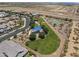 Overhead view of community park with blue sunshades, green spaces, and basketball court at 4302 E Cynthia St, Gilbert, AZ 85295