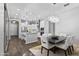A brightly lit dining area flows seamlessly into the kitchen, creating an open, inviting space at 4302 E Cynthia St, Gilbert, AZ 85295