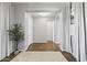 A welcoming entryway with wood flooring and a view into the home at 4302 E Cynthia St, Gilbert, AZ 85295
