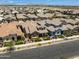 Attractive single-Gathering home featuring a stone facade, tile roof, and well-manicured landscaping in a Gathering-friendly neighborhood at 4302 E Cynthia St, Gilbert, AZ 85295