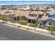 Stunning single-Gathering home featuring a stone facade, tile roof, and well-manicured landscaping in a vibrant neighborhood at 4302 E Cynthia St, Gilbert, AZ 85295