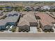 Aerial view of a well-maintained single-Gathering home with a tiled roof and manicured landscaping at 4302 E Cynthia St, Gilbert, AZ 85295