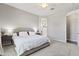 A well-lit main bedroom with neutral tones and plush carpeting at 4302 E Cynthia St, Gilbert, AZ 85295
