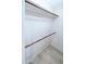 Empty closet with a wood rod and wood floor at 4303 E Cactus Rd # 128, Phoenix, AZ 85032