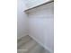 Empty closet with a wood rod and wood floor at 4303 E Cactus Rd # 128, Phoenix, AZ 85032