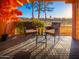 Cozy patio setup with outdoor seating, lush landscaping, and views of the golf course at 4303 E Cactus Rd # 128, Phoenix, AZ 85032