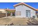 The house's backyard has an AC unit and a concrete patio at 522 W Dennis Ct, Tempe, AZ 85283