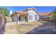 A view of the backyard featuring a concrete patio at 522 W Dennis Ct, Tempe, AZ 85283