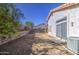 The backyard is surrounded by a block wall and has minimal shrubbery at 522 W Dennis Ct, Tempe, AZ 85283