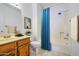 Clean bathroom with a shower, toilet, vanity, and simple decor at 522 W Dennis Ct, Tempe, AZ 85283