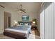 Stylishly staged bedroom featuring modern decor and sliding glass doors to let in lots of light at 522 W Dennis Ct, Tempe, AZ 85283