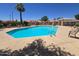 Inviting community pool with lounge chairs and a shaded pergola, perfect for relaxing and enjoying the outdoors at 522 W Dennis Ct, Tempe, AZ 85283
