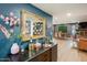 Cozy entryway with buffet, mirror, and floral decor at 5338 E Hearn Rd, Scottsdale, AZ 85254