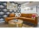 Stylish living room with a cozy sectional sofa and patterned wallpaper at 5338 E Hearn Rd, Scottsdale, AZ 85254