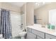 Bathroom featuring a shower-tub combo, neutral color palette, and modern fixtures at 5516 N 193Rd Ave, Litchfield Park, AZ 85340