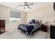 Bedroom with plenty of natural light from the window and a comfortable bed at 5516 N 193Rd Ave, Litchfield Park, AZ 85340