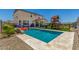 Backyard pool featuring patio, inground pool and slide at 5516 N 193Rd Ave, Litchfield Park, AZ 85340