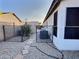 Backyard features an air conditioner and shed at 7313 S 25Th S Dr, Phoenix, AZ 85041