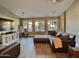 Bright and spacious living room with hardwood floors and large windows overlooking the backyard at 7313 S 25Th S Dr, Phoenix, AZ 85041