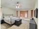 Spacious main bedroom with ample natural light, ceiling fan, and modern furnishings at 7313 S 25Th S Dr, Phoenix, AZ 85041