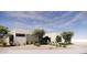 Elegant modern home with desert landscaping, stone accents, and a sleek design for sophisticated living at 8528 E Clydesdale Trl, Scottsdale, AZ 85258