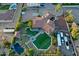 Desert home with custom pool, outdoor amenities, and lush desert landscaping at 9183 W Shamel Ash Rd, Peoria, AZ 85383