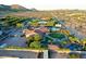 Expansive desert home featuring a sparkling pool, well manicured turf, and desert landscaping at 9183 W Shamel Ash Rd, Peoria, AZ 85383