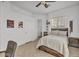 Bedroom featuring a bed, herringbone wood floor, and a ceiling fan at 9183 W Shamel Ash Rd, Peoria, AZ 85383