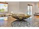 Detail of the kitchen island with granite countertops and decorative bowl at 9183 W Shamel Ash Rd, Peoria, AZ 85383