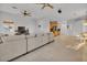 Expansive living area showcases an open floor plan, with views of the kitchen and dining area at 9183 W Shamel Ash Rd, Peoria, AZ 85383