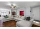 Spacious living room featuring hardwood floors and an open layout into the kitchen at 923 E Randy St, Avondale, AZ 85323