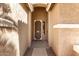 Inviting front entryway with a security screen door and neutral paint at 9465 W Tonopah Dr, Peoria, AZ 85382