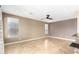 Living room featuring neutral-toned walls and tile floors at 9465 W Tonopah Dr, Peoria, AZ 85382