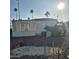 Mobile home exterior view featuring a satellite dish, modest landscaping, and basic features at 303 S Recker Rd # 98, Mesa, AZ 85206