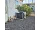 Exterior shot features an air conditioner and exterior of the home at 303 S Recker Rd # 98, Mesa, AZ 85206