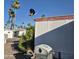 Exterior view with a grill, plants and palm trees in the background at 303 S Recker Rd # 98, Mesa, AZ 85206