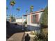 Single-story home featuring a gravel backyard and a patio, perfect for outdoor relaxation at 303 S Recker Rd # 98, Mesa, AZ 85206