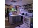 Functional kitchen space with countertops, an oven and open shelving at 303 S Recker Rd # 98, Mesa, AZ 85206