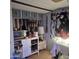 Functional kitchen area with countertops, appliances, and storage cabinets at 303 S Recker Rd # 98, Mesa, AZ 85206