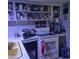 Functional kitchen featuring a stove, open shelving, and ample counter space at 303 S Recker Rd # 98, Mesa, AZ 85206