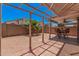 Expansive backyard featuring desert landscaping, a covered patio, and ample seating at 105 W Monona Dr, Phoenix, AZ 85027