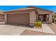 Charming single story home with a one-car garage and desert-friendly landscaping at 105 W Monona Dr, Phoenix, AZ 85027