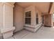 Welcoming covered front porch featuring classic columns and a view to the front door at 105 W Monona Dr, Phoenix, AZ 85027
