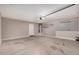 Attached two-car garage featuring an automatic door, water heater, and plenty of storage space at 105 W Monona Dr, Phoenix, AZ 85027