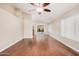 Spacious living room featuring wood floors and an open concept design to the kitchen at 105 W Monona Dr, Phoenix, AZ 85027