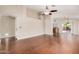 Spacious living room featuring wood floors and an open concept design to the kitchen at 105 W Monona Dr, Phoenix, AZ 85027