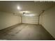 Spacious garage with automatic door and room for vehicles and storage at 13142 E Aster Ln, Florence, AZ 85132